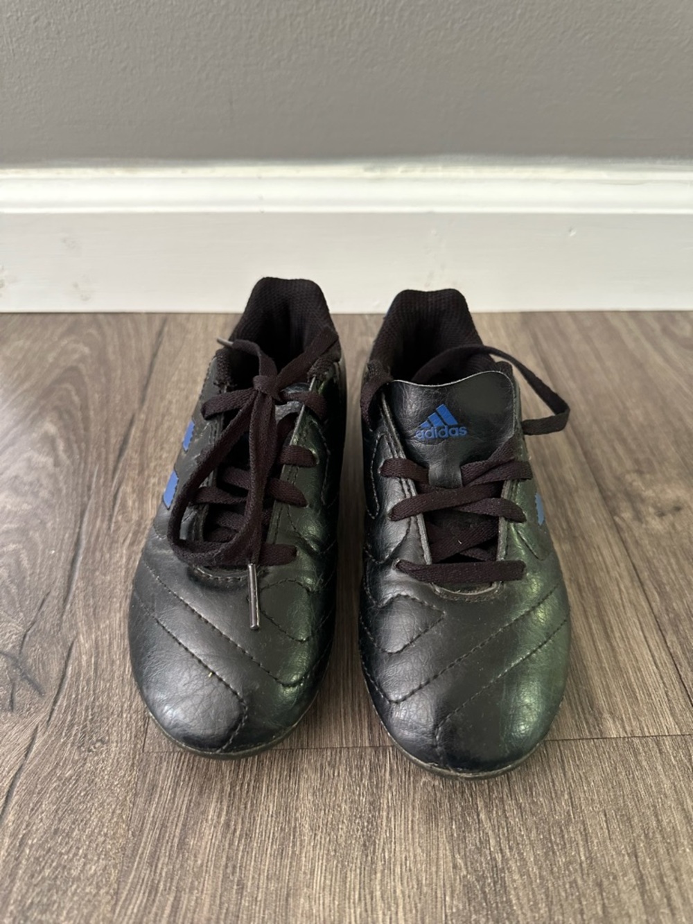 adidas Black Soccer Cleats with Blue Logo Accents